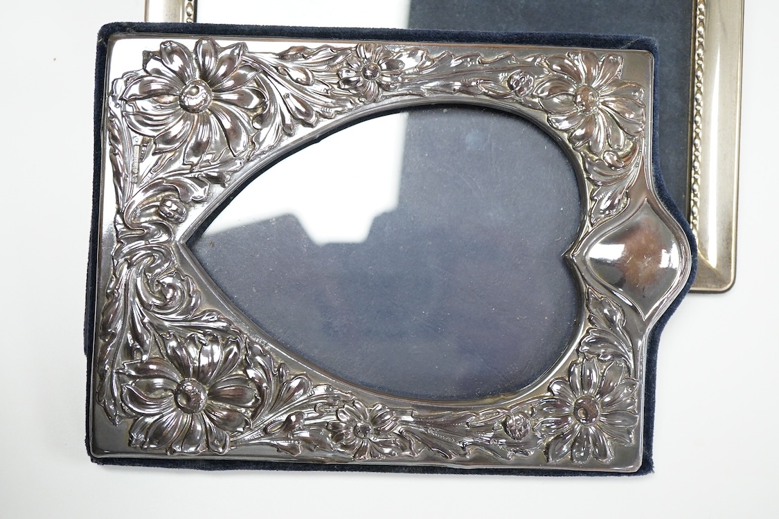 A pair of modern silver mounted photograph frames, 20.8cm and matching larger frame, 23.2cm, by Carr's of Sheffield, Ltd, Sheffield, 1996, together with one other modern silver mounted photograph frame and a similar Ital